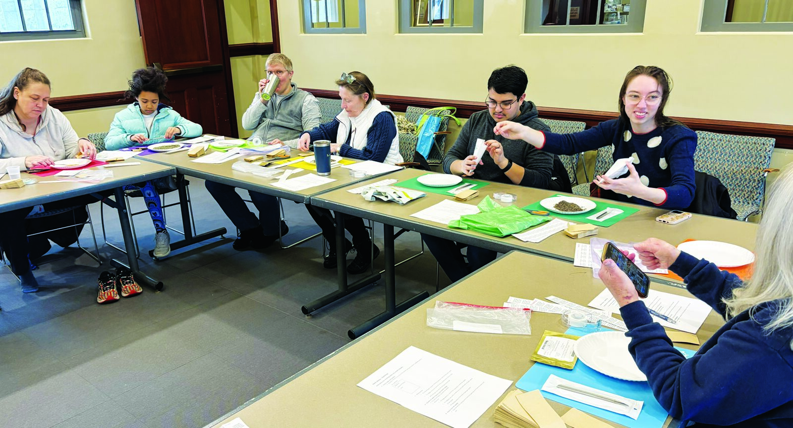 Residents Help Package Seeds for the Seed Library Ahead of Spring